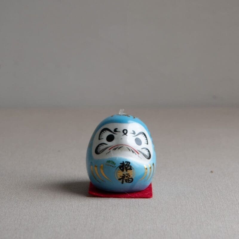 Mini daruma japonés azul