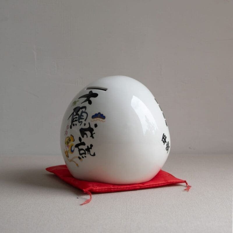 Hucha daruma blanco japonés de 12 cm