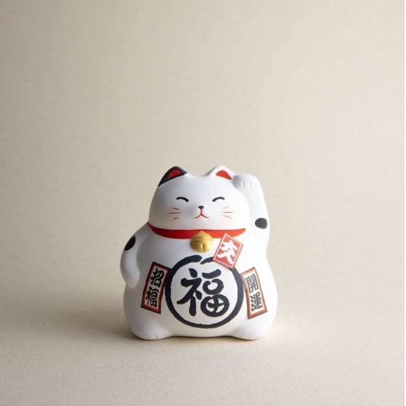 Gato de la suerte japonés blanco maneki neko